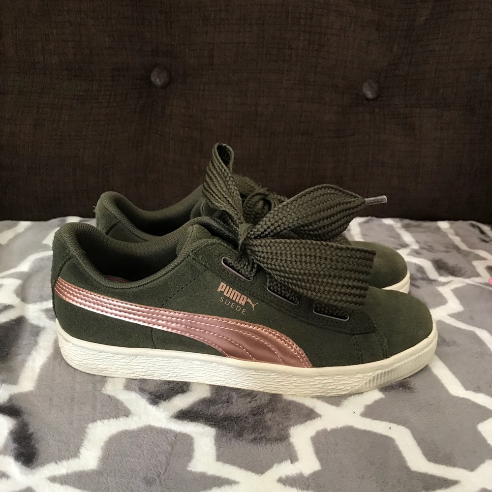 Olive green suede with rose gold Puma sneakers.